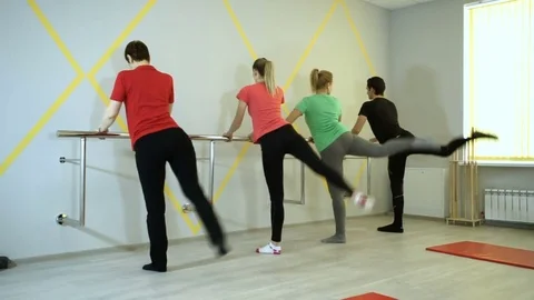 A group of people practicing exercises of gymnastics in sports hall. HD Stock-Footage 73119779
