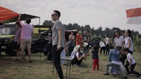 Group of people preparing equipment while on vacation Stock Footage 204851990