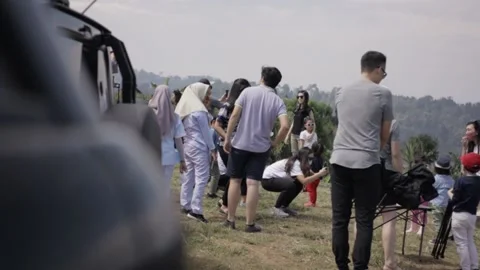 Group of people preparing equipment while on vacation Stock Footage 204851991