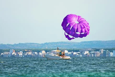 Group of people preparing for parasailing. Stock Photos