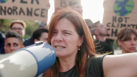 Group of people protests for climate change in the city - Global warming concept Stock Footage 237403821