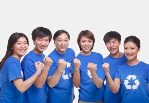 Group of people with raised fists, studio shot Stock Photos