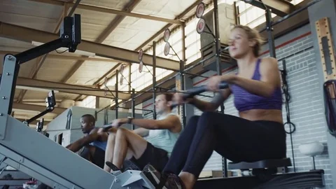 Group of people on rowing machines Video stock 71619253