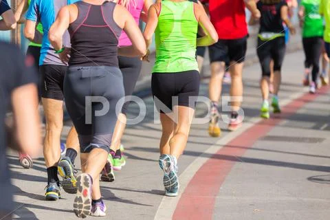Group of people running. Stock Photos
