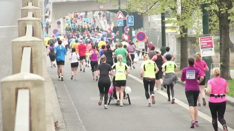 Group of people running at Pragues half Marathon event Stock Footage 36990062