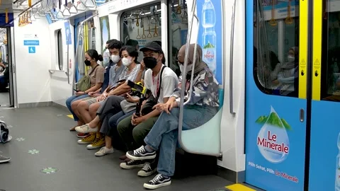A Group of People Sitting Inside MRT Stock Footage 201917319
