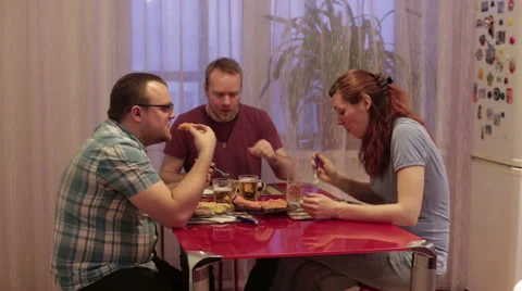 Group of people sitting at the table and dinner Stock Footage 59789417