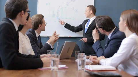 A group of people sitting at a table Stock Footage 130046861