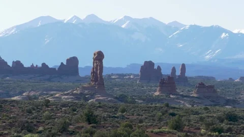 A group of people standing in front of a mountain Stock Footage 156012715