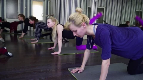 Group of people stretching in the studio closeup Stock Footage 75533728