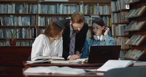 Group of People Talking in Library | Stock Video | Pond5