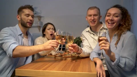 A group of people toasting and drinking at home. social distancing concept Video stock 167648205