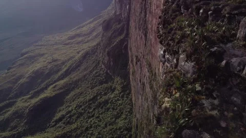 Group of people on top of Roraima Tepui huge mountain observing the vast Stock Footage 240734663