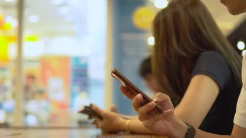 Group of people using smartphone texting, reading news or post on social medi Stock-Footage 94907356