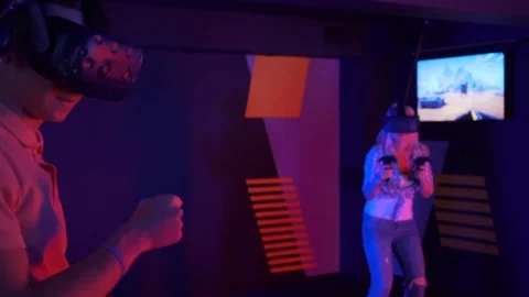 Group of people using virtual reality headset and controllers. Stock Footage 124365698