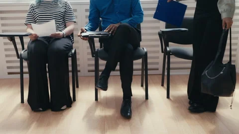 Group of people waiting for mortgage interview, live queue, recruitment process Video stock 228110158