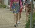 Group of people walking along beach SD Footage