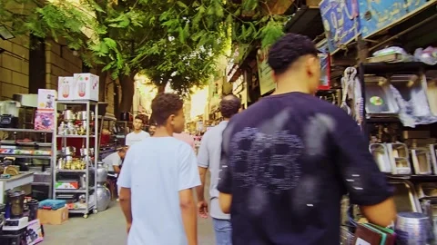 A group of people walking down a street Stock Footage 292252860