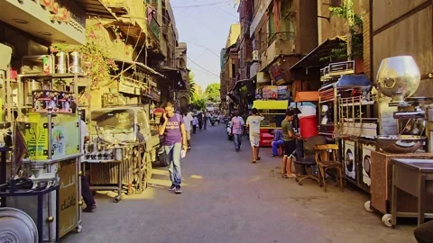 A group of people walking down a street Stock Footage 292259988