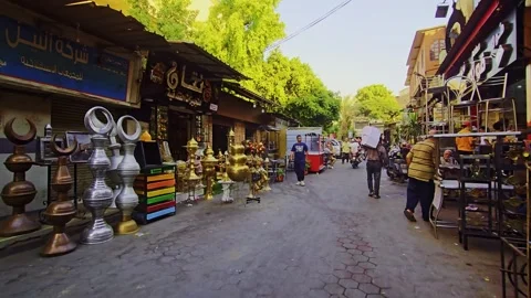 A group of people walking down a street Stock Footage 292262804