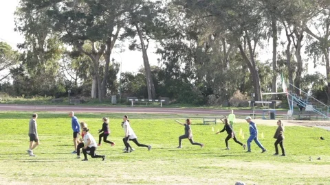 Group Of People Warming Up -athletes training  warm up on grass part-1/3 Stock Footage 85528705