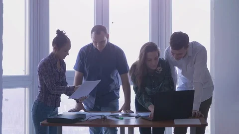 Group of people at the working place during corporate meeting in a stylish Stock Footage 86191659