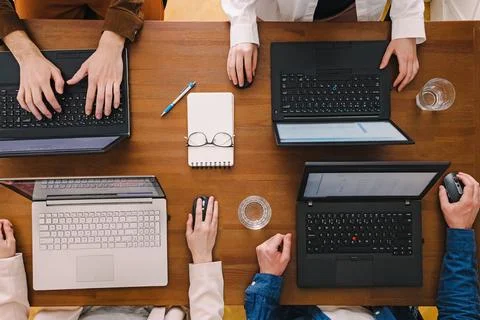Group of people working with their laptops Stock Photos