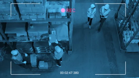 Group of People Working in Warehouse CCTV Shot Stock Footage 244769357