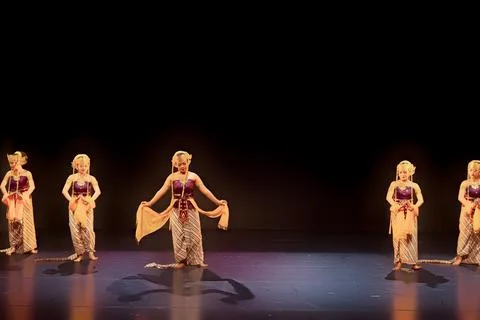 Group Performance Featuring Lead Traditional Dancer on Stage Stock Photos