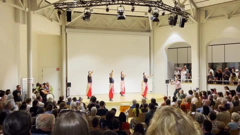 Group of performers presenting a Yosakoi dance performance with coordinated Stock Footage 340313503