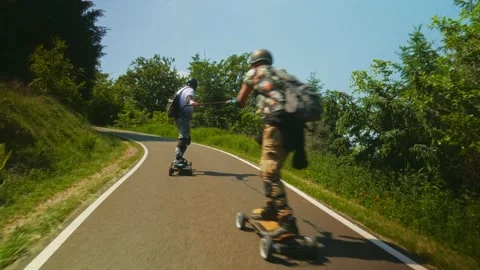 Group of PEV riders in Cwmcarn Forest, electric unicycle, electric skateboard Stock Footage 196807406