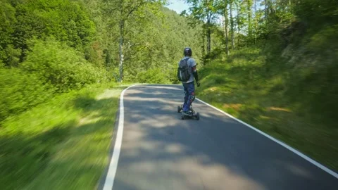 Group of PEV riders in Cwmcarn Forest, electric unicycle, electric skateboard Stock Footage 196807535