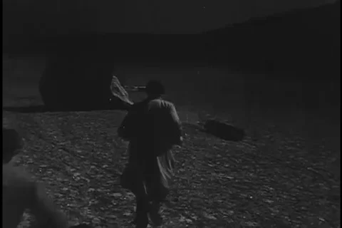 The group picks and loads the containers into the truck - 1943 Stock Footage 105752346