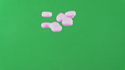 Group of pink heart-shaped objects being thrown in the air Stock Footage 100617903