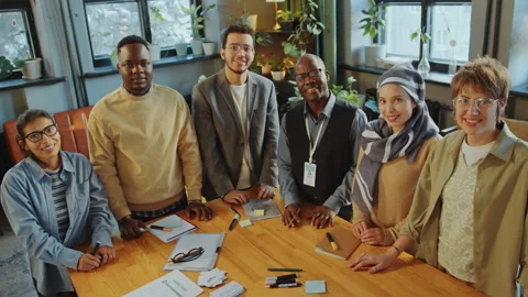 Group Portrait of Happy Immigrant Students and Teacher in Language School Stock Footage 274628665