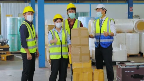Group of position diversity engineer in the workplace as a warehouse. Stock Footage 159843757