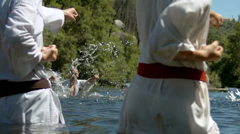 Group practice Karate on river Video stock 62616981