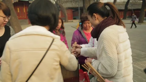 Group Preparing Incense Sticks in Temple Courtyard, Beijing, China Stock Footage 345828673