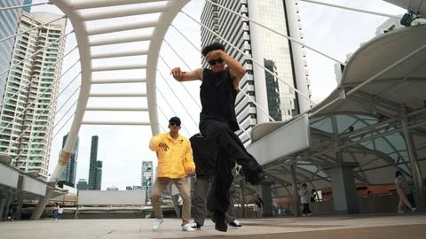 Group of professional dancer cheer up while hipster perform footstep. Sprightly. Stockfoto's