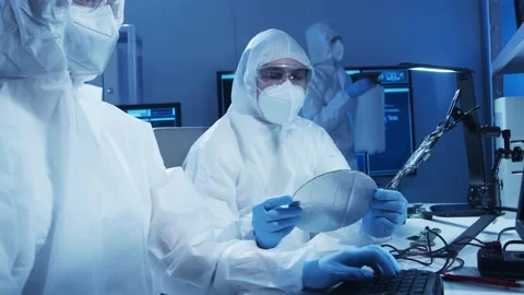 Group of professional engineer is developing a modern microprocessor in a Video stock 155699457