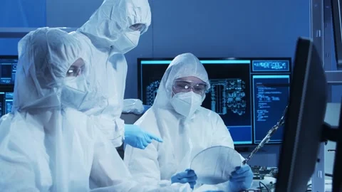 Group of professional engineer is developing a modern microprocessor in a Video stock 155699595