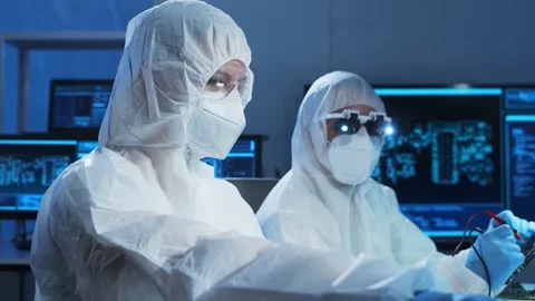 Group of professional engineer is developing a modern microprocessor in a Video stock 156040630