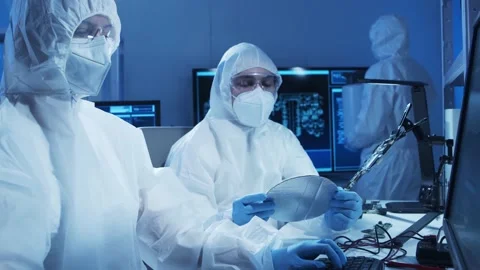 Group of professional engineer is developing a modern microprocessor in a Video stock 156139186