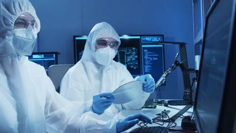 Group of professional engineer is developing a modern microprocessor in a Video stock 156566639