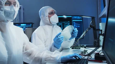 Group of professional engineer is developing a modern microprocessor in a Video stock 156977511