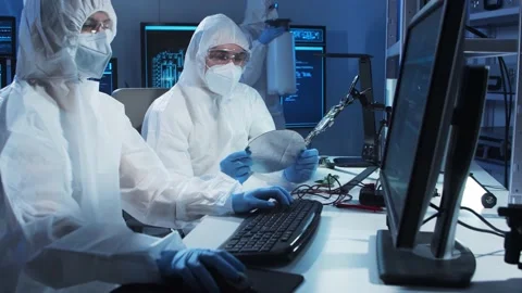 Group of professional engineer is developing a modern microprocessor in a Video stock 156977549