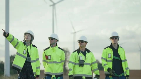 Group of professional engineers in safety vests Stock Footage 325553236