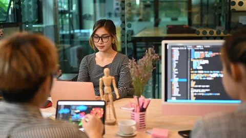 Group of professional it developer brainstorming, working with coded data in 스톡 사진