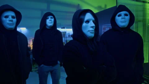 Group of Professional Masked Cyber Thieves in Dark Office of IT Company Stock Footage 299270090