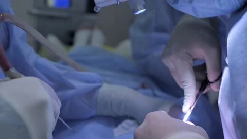 Group of professional surgeons working in operating room Stock Footage 150505867